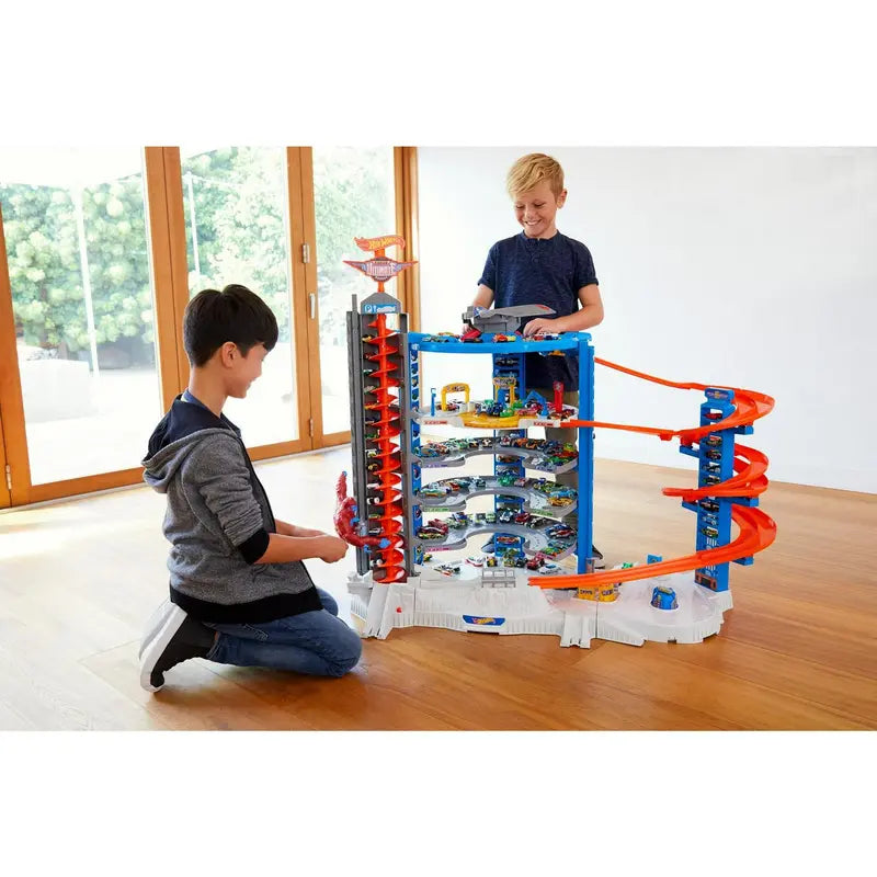 Hot Wheels Super Ultimate Garage Track Set with 4 Toy Cars & Jet Plane, 3-Foot Tall, Motorized Elevator, Ages 5-8